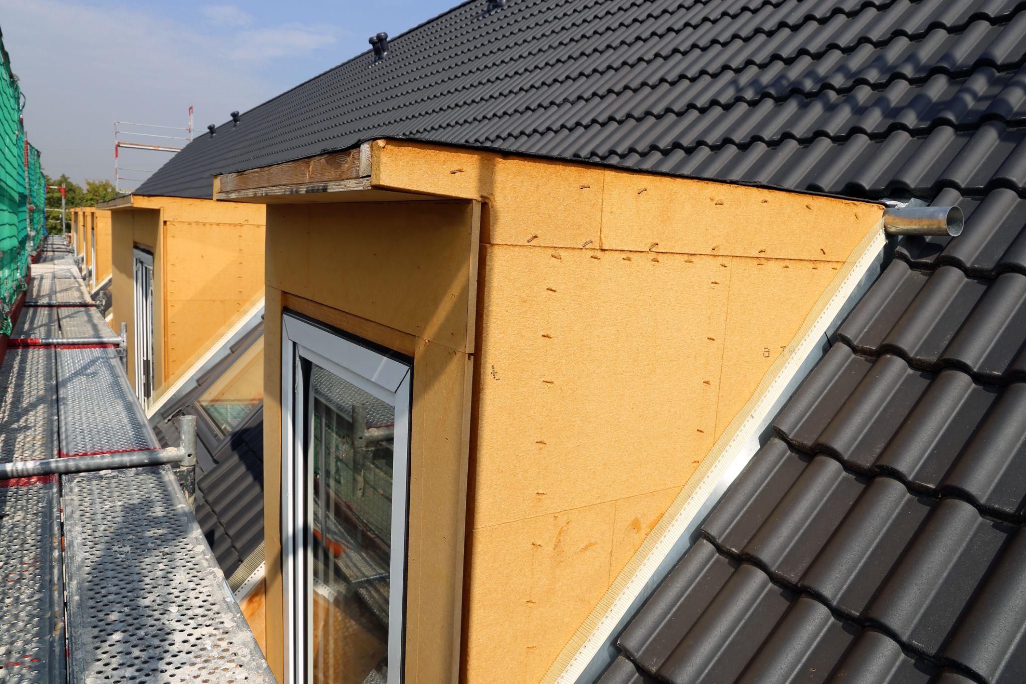 Gauben und Dachflächenfenster